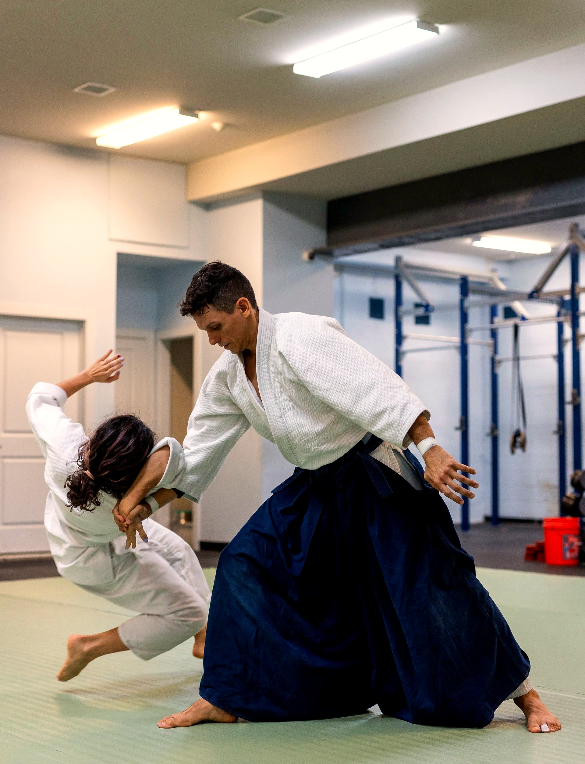 Cruciani Sensei guiding a partner through a fall